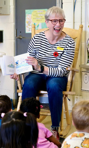 Karyn reading to Kindergarten classes.